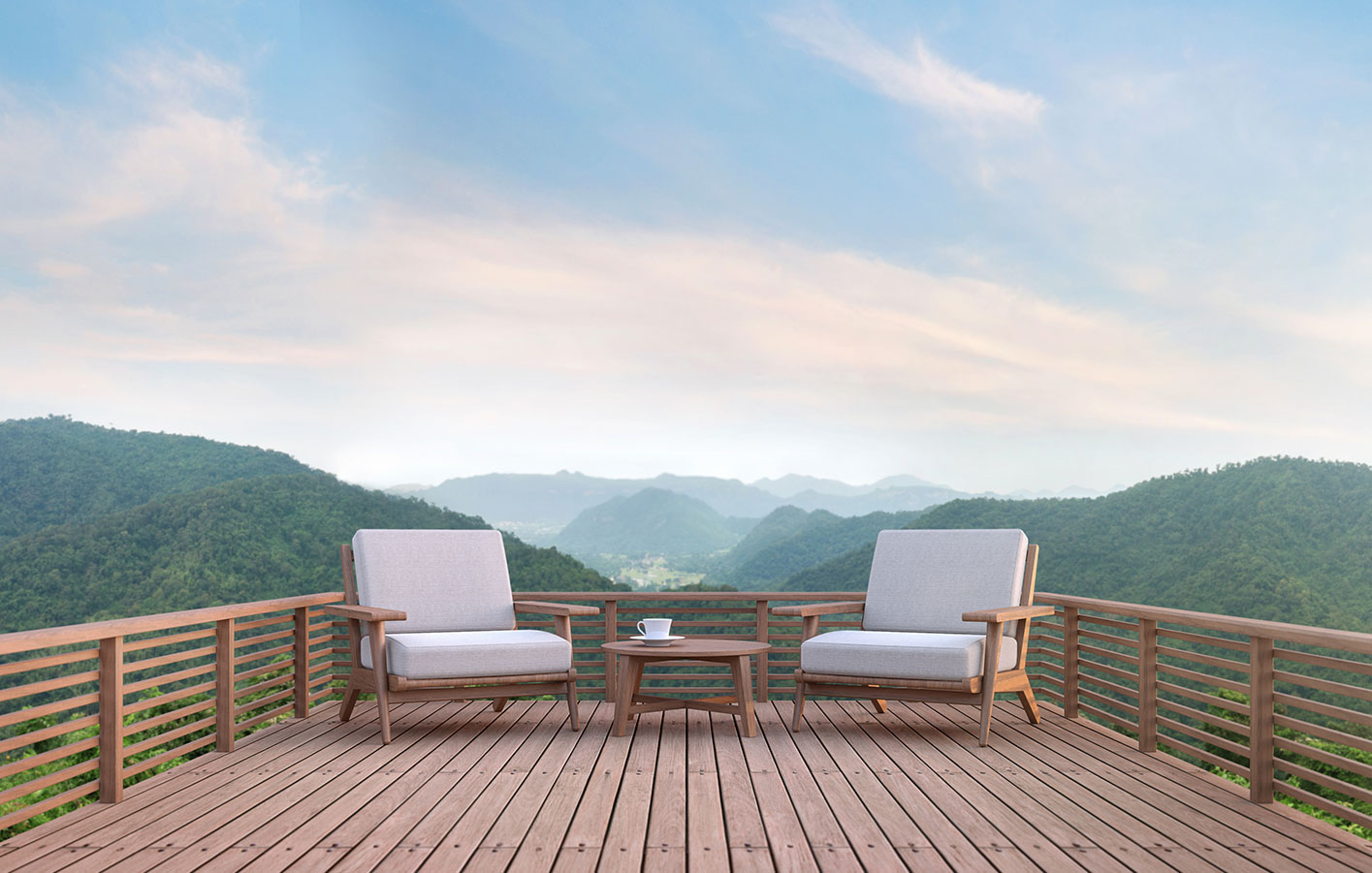 Terrassenmöbel auf einer Terrasse mit Blick ins Grüne